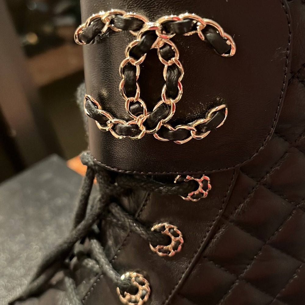 Authentic Chanel, almost new worn only a couple of times lace up combat boots.